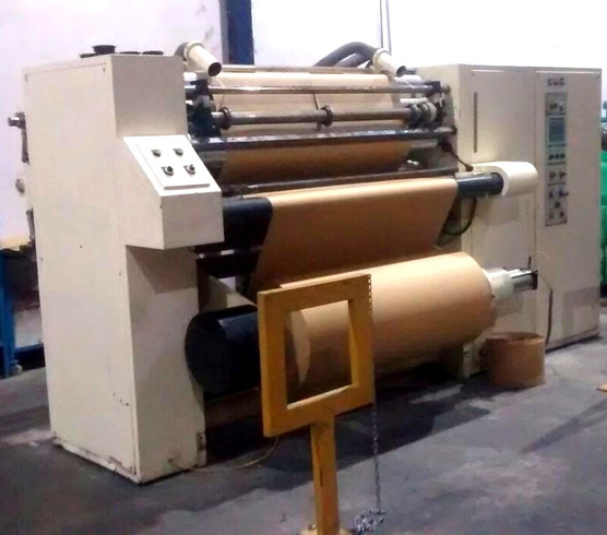 Narrow web slitter and rewinder
